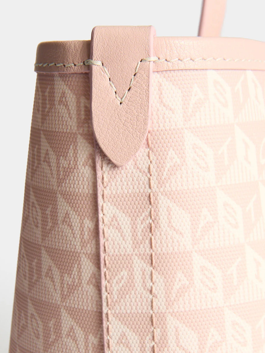 I am a Plastic Bag Zipped Tote in Shell Pink Monogram