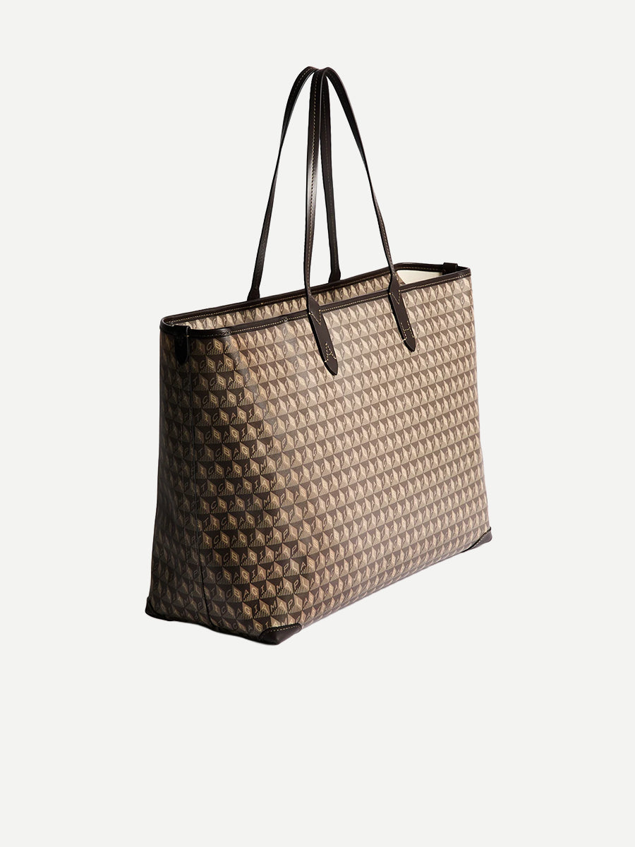 I am a Plastic Bag Zipped Tote in Truffle Monogram