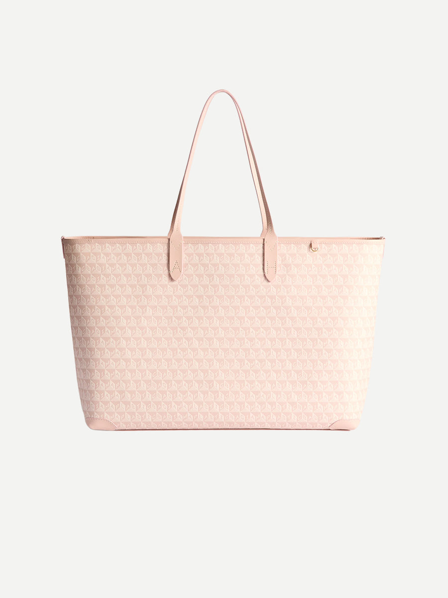 I am a Plastic Bag Zipped Tote in Shell Pink Monogram
