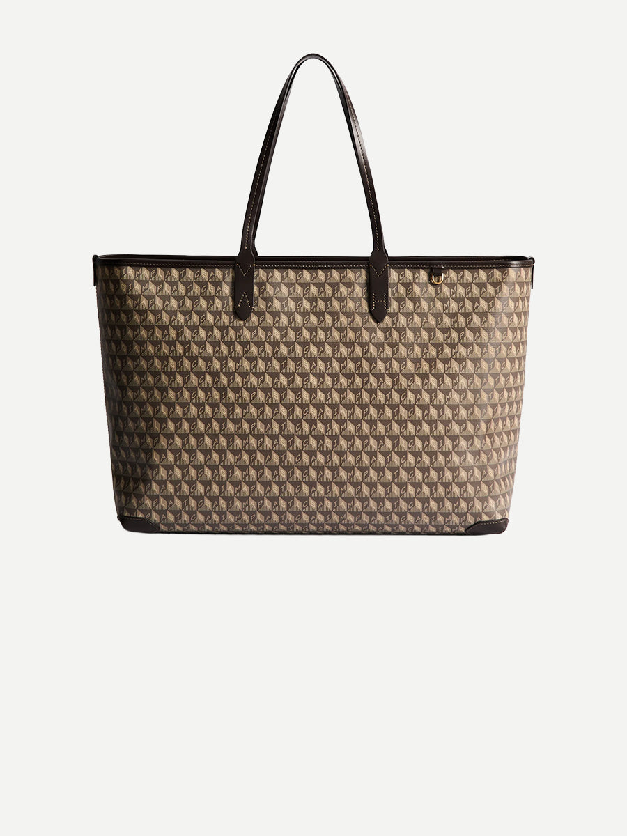 I am a Plastic Bag Zipped Tote in Truffle Monogram